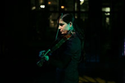 A violinist performed for guests