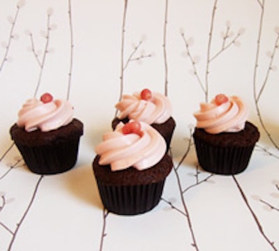 Dark chocolate cupcakes with pomegranate frosting