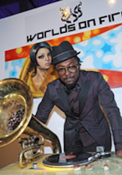 Will.i.am kicking off the 'Worlds on Fire ' exhibition