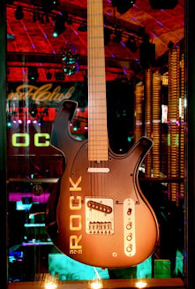 Branded guitars flanked the entrance to the upper level skyboxes.