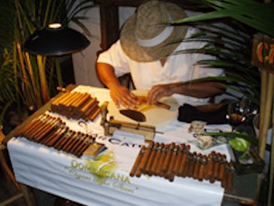A CF Dominicana Cigars roller at a Maybach Mercedes event