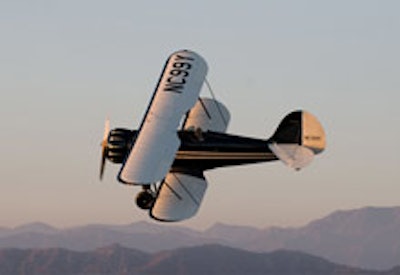 The Black & White Biplane in flight