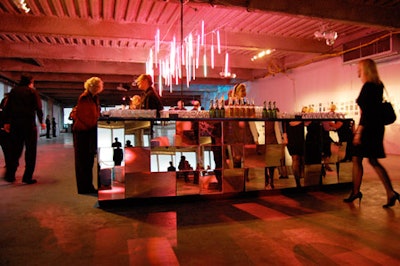 A mirror-covered bar and neon chandelier at 7 World Trade