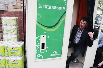 A green photo booth