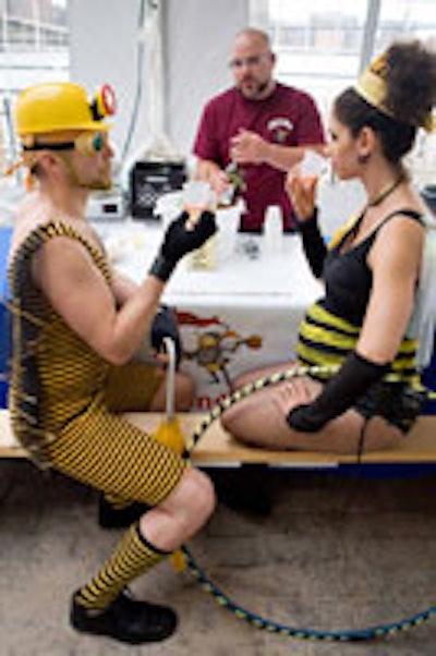 Bee enthusiasts sipping samples of honey wine