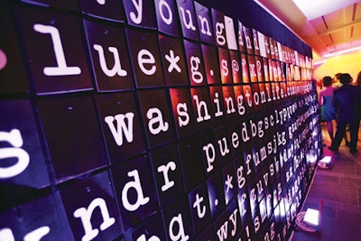 Guests at a Washington Life event could form words on a 20-foot-long movable wall of letters.