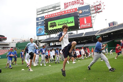 Participants warming up at the Washington Nationals Youth Training Clinic