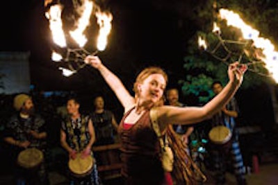 A fire dancer entertained the valet line at the Shedd Aquarium gala in Chicago.