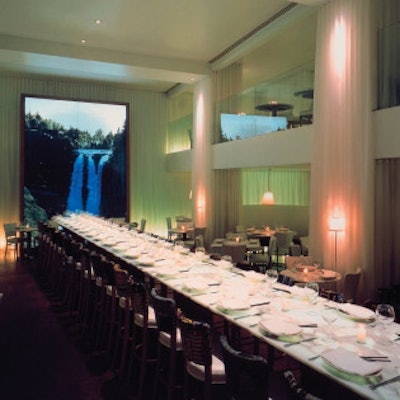 Asia de Cuba’s 50-foot-long illuminated alabaster communal table