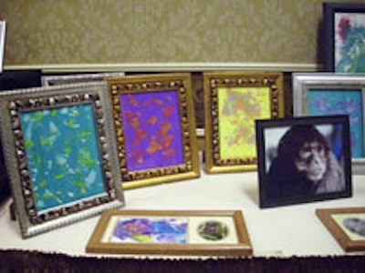 Framed art made by monkeys on display at the Jungle Friends fund-raiser