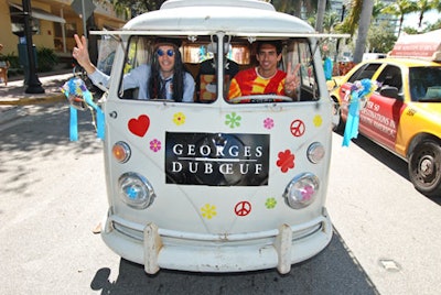 The Volkswagen love bus leading the motorcycle procession