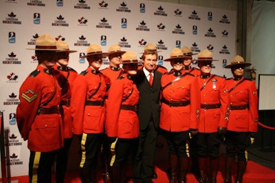 Wayne Gretzky with officers from the Royal Canadian Mounted Police