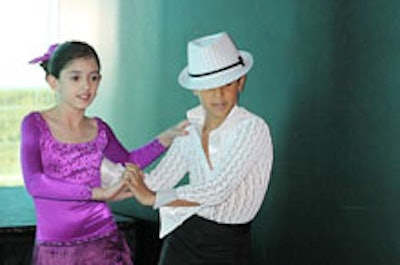 Kaitlyn Paez and Martin Rivas dancing at the 'Artfully Sweet ' fund-raiser