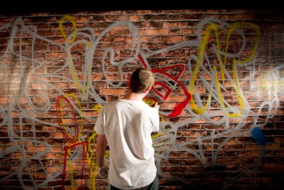 Graffiti artist Matthew Litwack at American Idiot's opening party