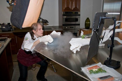 A cooking demo at Schawk Retail Marketing's open house