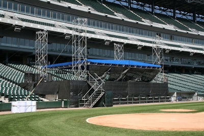 Stage and roof built over dugout and stadium seats