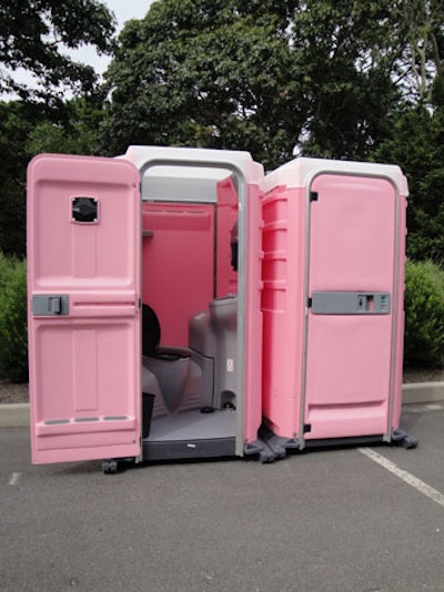 Pink flushable portable restroom with self-contained sink