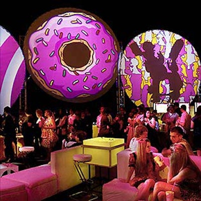 Imagery is projected onto round screens for The Simpsons Movie premiere.