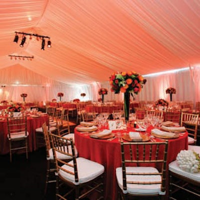 Swaging treatment, gold Chiavari chair with ivory cushion, red linen