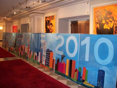 CVS team-building event: Painting on 4x5’ canvases to create a 40-foot Chicago skyline.