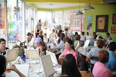 A painting party in Bottle & Bottega’s main studio.