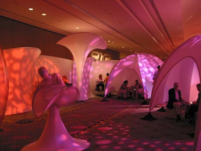 TS2 trade show for trade shows spiced up their convention with a Block Party Event. Pink's Mod Pods create lounge nooks while our Hourglass Diva entertains. Lighting creates the mood with dynamic design, LED light fixtures and projections.