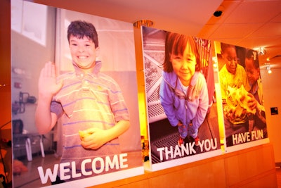 Bright photos of children from the YMCA decorated the entryway.
