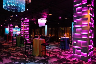 Organizers programmed the LED lights embedded in three floor-to-ceiling columns to alternate among bright colors such as pink, green, and blue.