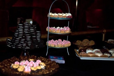 In addition to cups of candy, boxes of pizza, and bags of PopChips, guests could nibble on the dessert buffet's ample spread of sweet treats.