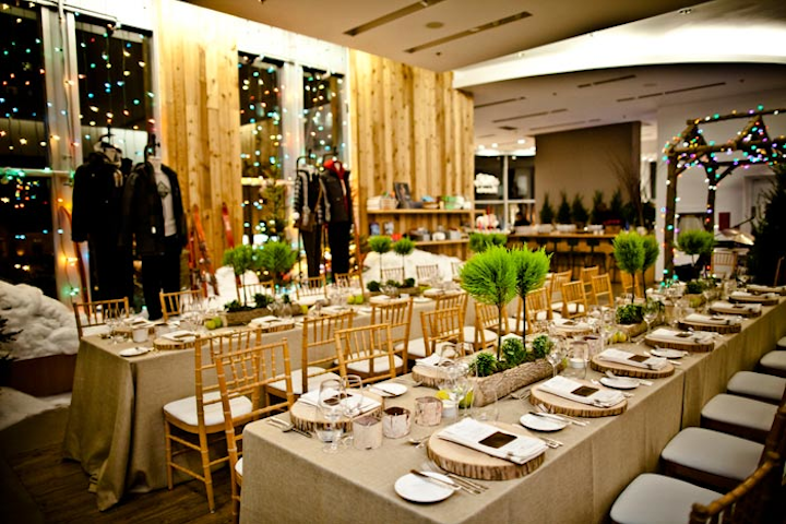 Guests at Roots dined on the second floor of the Bloor Street location, decorated with fake snow, Christmas lights, and Roots clothing.