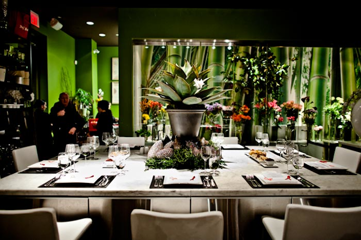 A unique living centrepiece was lined with glittering pine cones on the square tabletop in Teatro Verde.