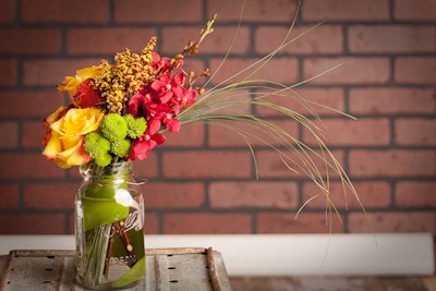 Blooms of Boston, a new florist, can create quick, simple arrangements for holiday parties. For events this season, the designers have filled Mason jars with mums, bear grass, and Mokara orchids, and placed the jars down the center of a long table. They can also prepare more elaborate arrangements.