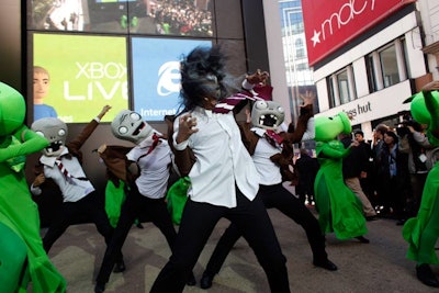 In addition to live installations inside the phone, Microsoft brought performers to the street, including dancers dressed as characters from video game Plants Vs. Zombies.