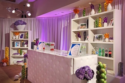 Inside the meeting rooms of the Four Seasons Hotel, Caravents created a modern setting by using white as a base color and adding floral arrangements and fruit-and vegetable-filled vases for pops of color.