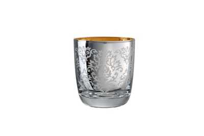 The double old-fashioned Silver and Gold Brocade Glasses from Chair-man Mills add sparkle to a holiday table setting.
