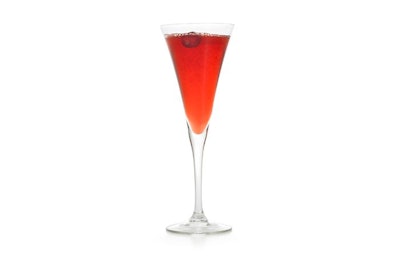 The festive Cranberry 75 from the Martini Club is made with homemade cranberry syrup and garnished with a cranberry.