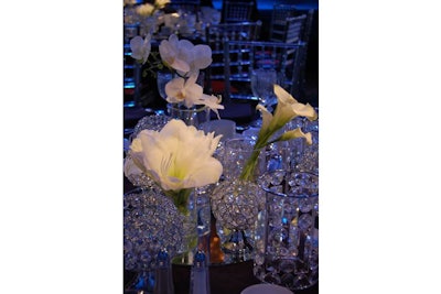 Pick Ontario supplied white floral centrepieces with crystal votives from Crystal World.