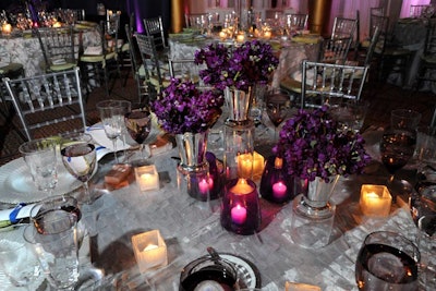 In the dining space, flower arrangements by Amaryllis incorporated the foundation’s signature purple color, while silver chairs with Lucite rungs created a light and airy look.