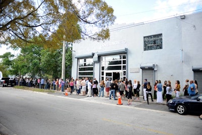 Guests waited in line to get in to the Gilt City Warehouse Sale on Saturday.