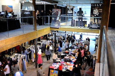 Guests perused Gilt City's merchandise as DJ Johnny the Boy provided music from the second-floor catwalk.