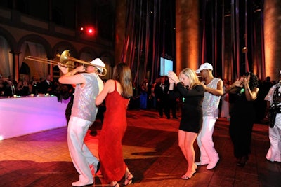 Guests joined band members in a conga line that snaked around the dance floor.