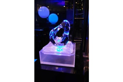 In the cocktail reception space, ovoid ice sculpture centrepieces sat on every cocktail table. The fluid, organic shapes were inspired by the work of all three designers.