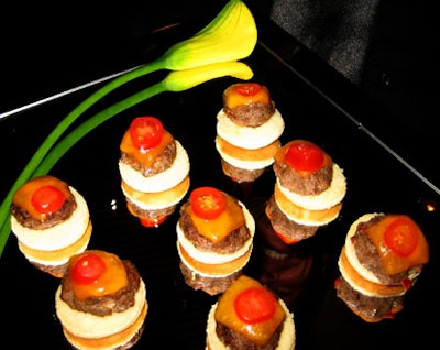 Shiraz Catering offered mini cheeseburgers to guests in the museum's foyer, where the silent-auction items were also displayed.