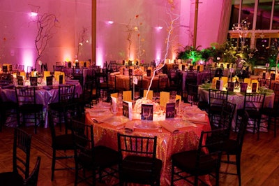 The dinner following the Ailey performances featured pink and orange lighting and tall branches dotted with orchids as centerpieces.