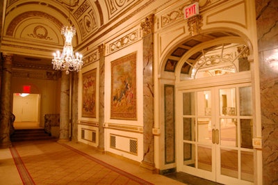 Lining the passageway beside the ballroom—also known as the grand corridor—are delicate tapestries, which were cleaned and repaired as part of the renovation.