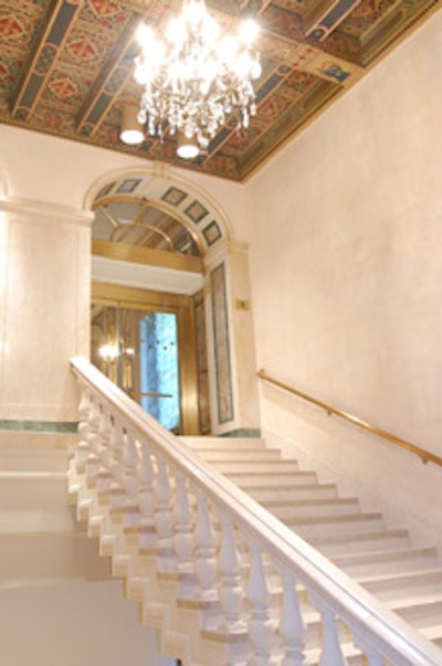 A wide staircase leads from the dedicated events entrance to the Plaza's second-floor event spaces.