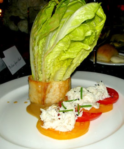 For the second course, the hotel served a baguette filled with lump crab meat and red and yellow tomato, balsamic vinaigrette, and accented with a standing romaine leaf.
