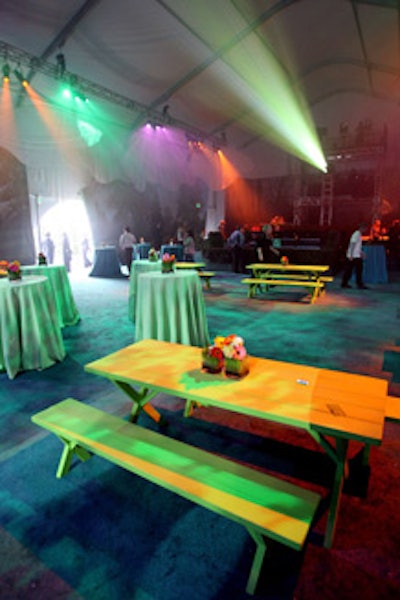 Guests sat at picnic tables while snacking on an assortment of menu items made from organic and locally grown ingredients.