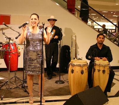 Miguel Cruz & Tropical Dreams entertained guests as they perused the new store.