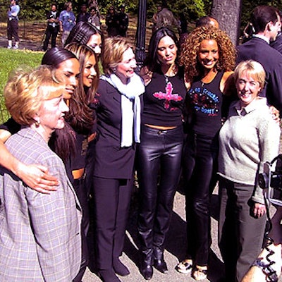Senators Jean Carnahan, Hillary Rodham Clinton and Patty Murray posed with pop group Eden's Crush.